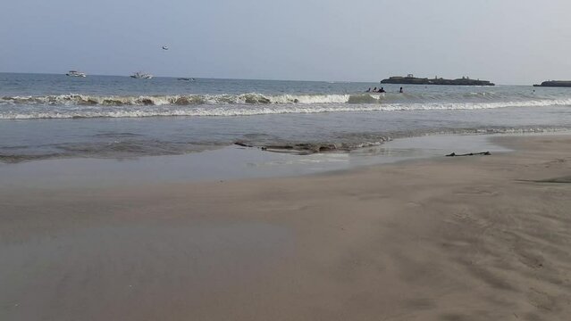 Beautiful View of The  Indian ocean Waves on Nagaon beach in Diu, Gujarat, India. High Quality Video Footage.