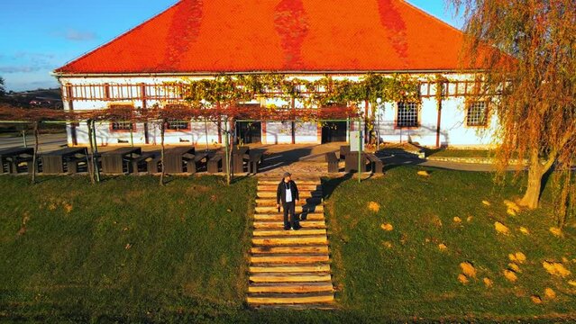 Stunning aerial 4K drone footage  of an old vineyard cottage, Malek - Jeruzalem, Slovenia. Filmed on a crisp, sunny late autumn day, this captivating video showcases beautiful Slovenian countryside.
