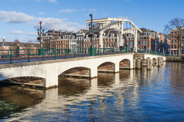 Magere Brug or Skinny Bridge across the Amstel River in Amsterdam Netherlands