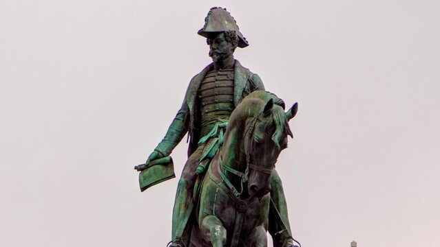 Liberdade square with monument of King Peter IV and Porto city hall, timelapse hyperlapse close up view at cloudy day, Porto, Portugal