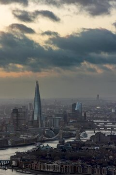 Vertical sunset to night time lapse view of the London skyline with Tower Bridge and River Thames, England