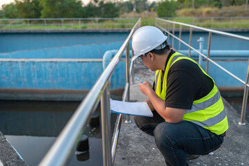 Environmental engineers work at wastewater treatment plants,Water supply engineering working at Water recycling plant for reuse