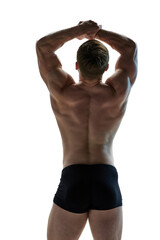 Rear view portrait of male muscular body against white background. Male model with healthy back demonstrated his muscles. Concept of beauty care, male health, masculinity. Ad. Copy space.