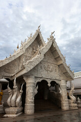 Naklejka premium Wat Ming Mueang, a white temple in Nan town, North Thailand.