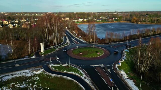Roundabout intersection with light traffic in rural cold climate during the day