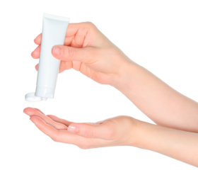 Woman hands squeezing a white cosmetic cream tube, on white background close-up, template for cosmetics ads