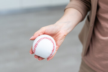 Small toy baseball isolated on white background