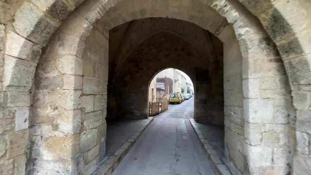 Emblematic view of the Lhyan Gate in the medieval town of Rions, Gironde, France, High quality 4k footage