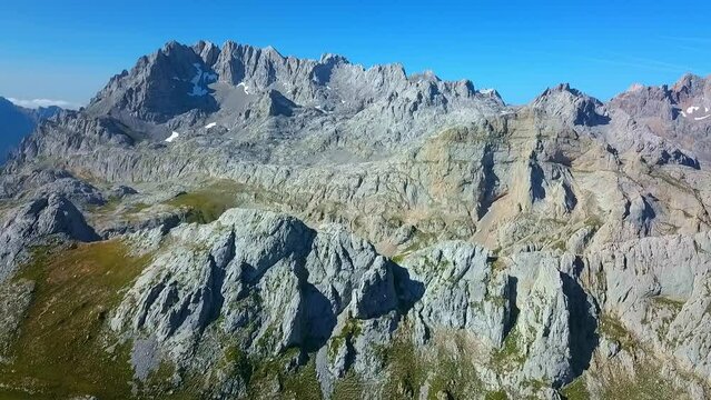 Picos Symphony: Aerial ode to rugged beauty, where peaks touch the sky.