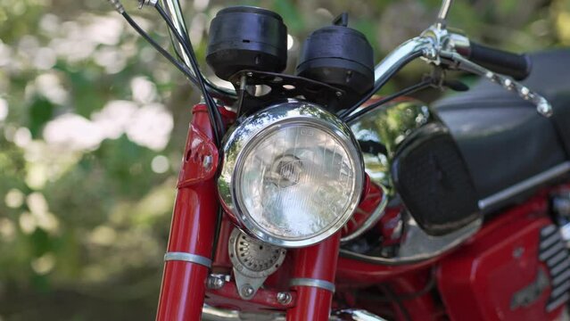 Retro Motorcycle Headlight and Handlebar - Close up