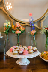 Spring confectioneries and vases of florals