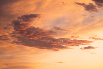 Fototapeta na wymiar orange clouds in the sky at sunrise