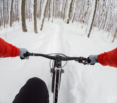 GoPro view of a fat biker riding his bicycle in the snow during Canadian winter