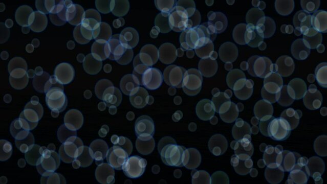 Animation of bubbles drifting upward on black background