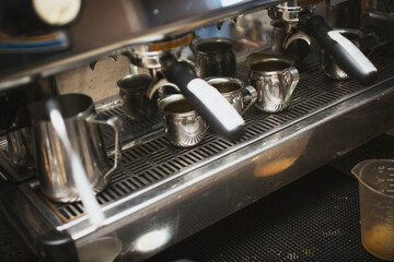 Fototapeta na wymiar A view of an espresso machine, seen at a local coffee shop.