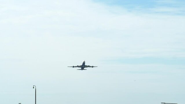 An airplane descending from the tarmac as it departs from Suvarnabhumi airport in Bangkok, Thailand.
