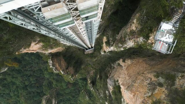 Descending shot revealing the Bailong Elevator at Zhangjiajie National Park, China