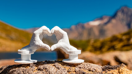 Heart hands gesture with a 3D printed sculpture - free model from thingiverse - at the famous...
