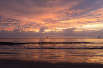 Fototapeta na wymiar Orange sunset on the beach of Thailand