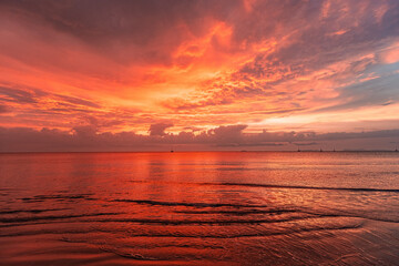 Orange sunset on the beach of Thailand