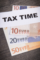 Inscription tax time and euro banknotes. Calculating and paying tax for previous year