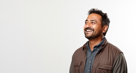 Adult hispanic man over isolated background looking away to side with smile on face, natural expression. Laughing confident. - obrazy, fototapety, plakaty