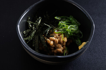 Natto japanese appetizer food isolated in black background