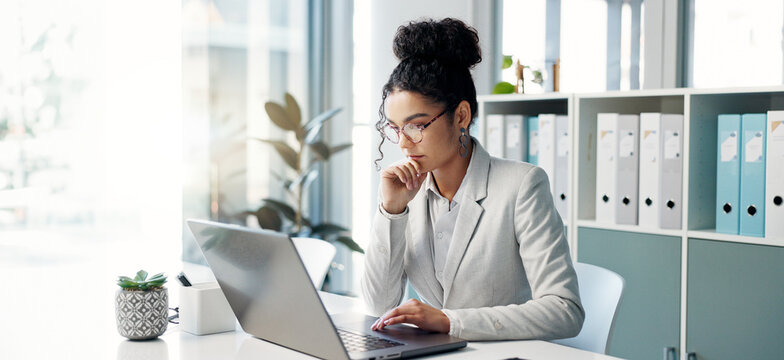 Thinking, laptop and typing business woman, bank consultant or working on research report, project or solution. Computer, administration analysis and professional person reading online account data