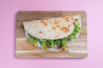 Italian cuisine , Piadina with sausage and cheese