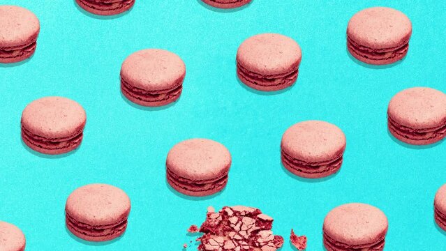 Animation. Stop motion. French almond cookies on dessert top view. Food pattern with macaroons over blue background flat lay top-down composition. Find difference. Concept of food, diet, ad.