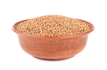 Raw buckwheat in bowl isolated on white