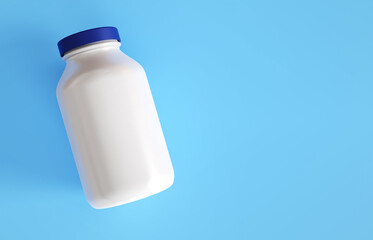 Plastic medicine bottle on blue background with copy space. Medicine and health concept. 3d rendering