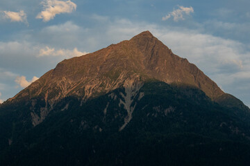 Lonely mountain in sunset in summer