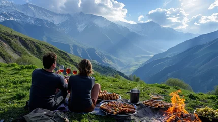 Fotobehang you sit high on the Caucasus mountains and drink wine while eating delicious kebab © Vuqar