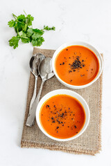 Healthy Tomato Soup Bowl on White Background Directly Above Photo