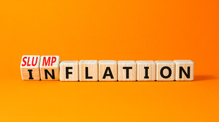 Inflation or slumpflation symbol. Concept word Inflation Slumpflation on beautiful wooden cubes. Beautiful orange table orange background. Business inflation slumpflation concept. Copy space.