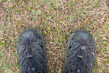 Fototapeta na wymiar boots on grass
