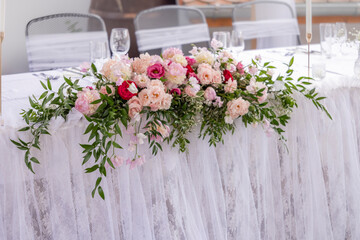 Wedding table with pink flowers