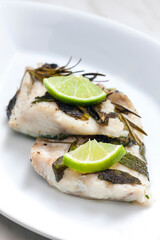 white fish fillet baked with herbs