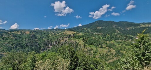 Fototapeta na wymiar dirty road throught mountain pass in georgia