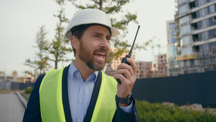 Caucasian aggressive annoyed worker man in hardhat angry mad furious architect engineer contractor...
