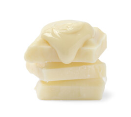 Pieces of chocolate and tasty paste isolated on white