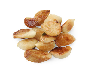 Pile of fried garlic cloves isolated on white, top view