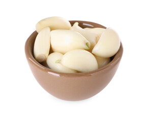 Peeled cloves of fresh garlic in bowl isolated on white