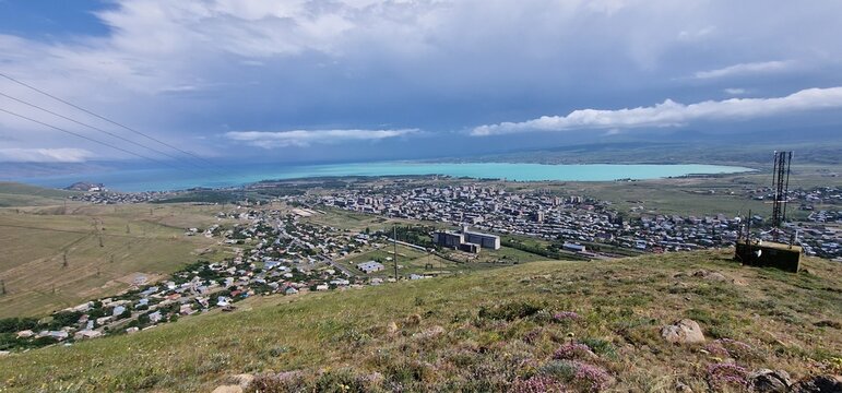 Armenia landscape, village, mountains, lake Sevan, summer scenery oncoming storm