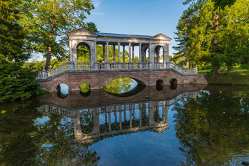 Marble Bridge (Palladian Bridge) in Catherine Park with reflection in the water