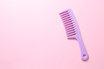 pink comb on pink background
