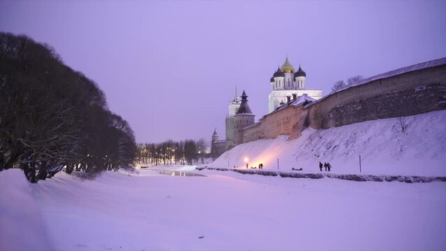  view of the Holy Trinity Cathedral in winter evening, snowfall. Pskov Kremlin