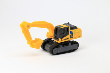 Excavator, toy car isolated on white background ,die cast car, toy car, white background
