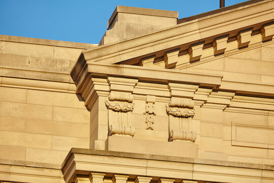 Neoclassical Stonework Detail and Blue Sky Perspective